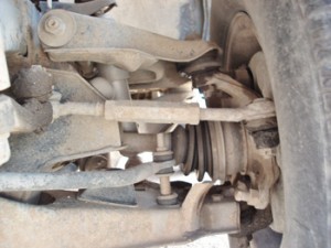 The tie rod assembly on this MacPherson strut front suspension is connected directly to the rack and pinion steering gear. 
