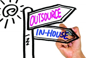 outsource or in-house signpost hand drawing on whiteboard
