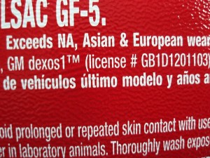 Photo 1: Modern oil labeling is very complex. Along with meeting the ILSAC GF-5 rating, this oil bottle label lists a GM Dexos™ license number, indicating approval by General Motors. The oil also claims to exceed Asian and European wear requirements.