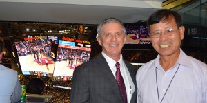 Photo of Jimmy Yang, Kenda president of North America and honorary team captain for the Cavs opening game last night with Kerry Bubolz, Cleveland Cavaliers president of business operations.
