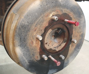 puller bolts and penetrating oil are required to remove many import brake drums. a light film of synthetic caliper grease on the axle hub will reduce the tendency of the drum to seize to the hub.