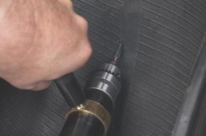 5. using a low speed drill (max. 500-700 rpm) and a 3/16-inch tapered carbide cutter, ream the injury following the angle of penetration from the inside of the tire. use proper eye protection.