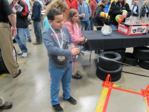 There were plenty of activities to keep the young, upcoming tire dealers busy, including RCcars, a jump house and coloring table.