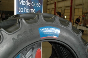 Part of a pilot production run in February, the first Mitas tire cured at the new factory in Charles City was proudly displayed.