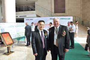 Wang Feng, Aeolus general manager, and Manny Cicero, Alliance Tire Americas president.