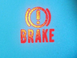 photo 3: the brake warning light indicates that the park brake is applied or that a hydraulic failure is present.