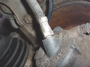 photo 6: brake hoses usually begin to crack at or near the metal ferrule attaching the hose to the brake caliper