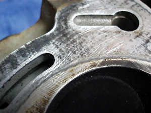 Although rough surface cuts might work on cast-iron cylinder heads, rough gasket surfaces spell disaster on an aluminum head design.
