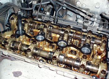 While the slightly varnished interior of this engine is normal, the varnish might not have accumulated if the oil change intervals had been shortened.