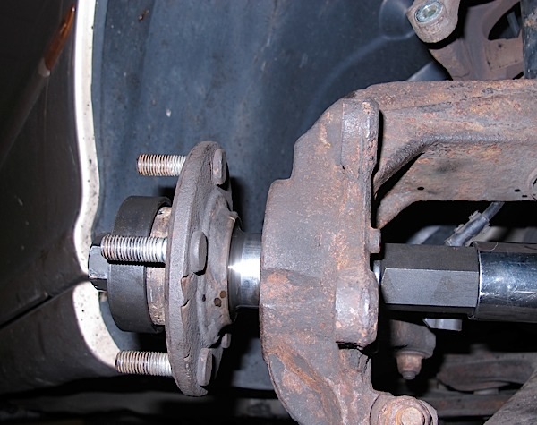 pressing on the stub axle/flange