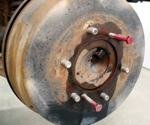 puller bolts and penetrating oil is required to remove many import brake drums. a light film of synthetic caliper grease on the axle hub will reduce the tendency of the drum to seize to the hub.