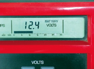 photo 1: before an adjustable carbon pile load test can begin, the battery should display at least 12.4 volts at its terminal.