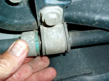 photo 7: corroded stabilizer bar bushings and stabilizer connecting links can cause a squeaking or grating noise. a waterproof synthetic lubricant will remedy many of these noises.