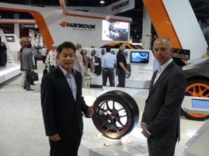 Soo-Il Lee, Hankook Tire America Corp. president and CEO (left), with Shawn Denlein, senior vice president of sales and marketing, at the companys Global Tire Expo/SEMA Show booth.