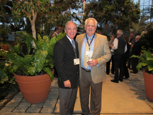 Len Lewin, left, with Ben Kravitz, president of then ACCC member distributor Summit Tire  at the opening of the firstEcoExpress store in 2010.
