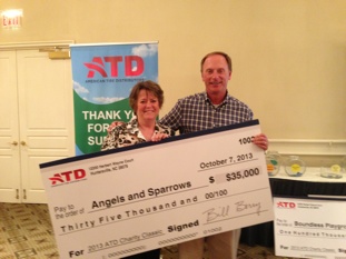 Bill Berry, president and CEO of ATD, with Sandy Tilley, executive director of Angels and Sparrows Soup Kitchen. 