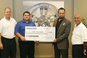 (left to right) tom mccarthy, accc program manager for american tire distributors, inc.; chad duke, owner of duke's tire; jeremy lewin, accc director of marketing; and cal hersom, accc director for american tire distributors, inc.