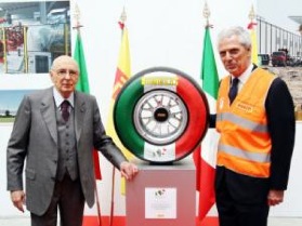 Pirelli chairman Marco Tronchetti Provera (right) presents Italian president Giorgio Napolitano with the tricolor F1 tire during a tour of the new Settimo Torinese facility.