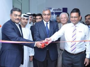 Satish Sharma, chief, India Operations, Apollo Tyres Ltd. (center) cutting the ribbon to inaugurate the Dubai office.