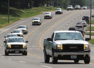 Sixteen Plaza Tire Service trucks led the funeral procession for Pee Wee Rhodes, who died July 29 at age 76.