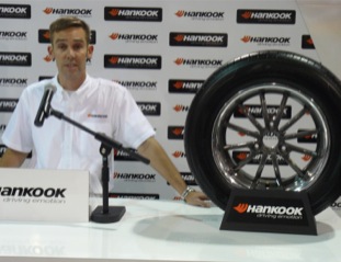 Henry Kopacz, public relations and product marketing specialist for Hankook Tire America Corp., shows the features of the new enfren eco.